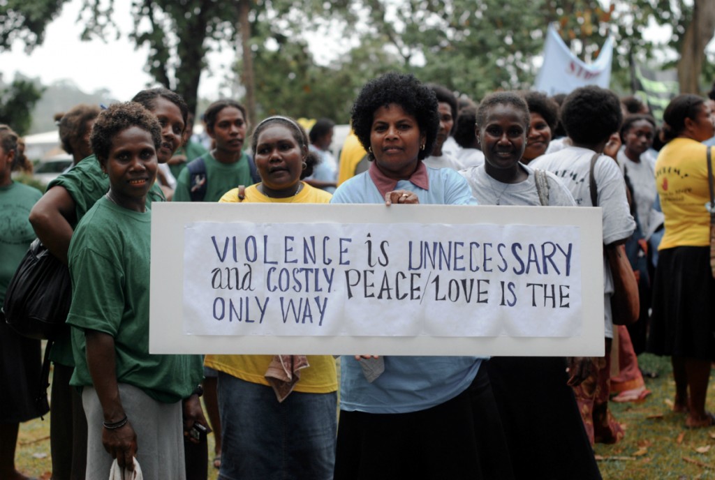 Women in the Solomon Islands gather on White Ribbon Day 2009 to rally against domestic violence. Image via Wikimedia Commons.